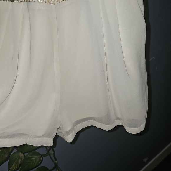 3/20.00. Classy white romper with sequins. - Picture 7 of 10